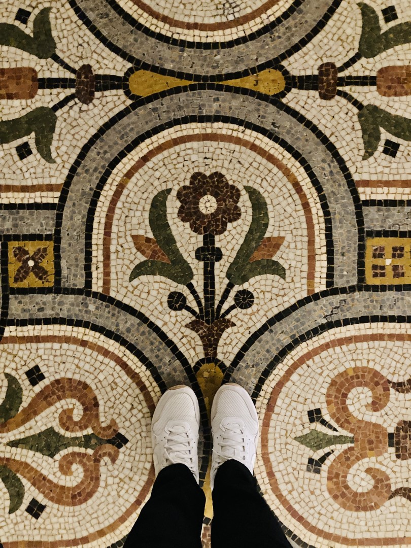 The tiled mosaic floor at Palais Garnier in Paris.