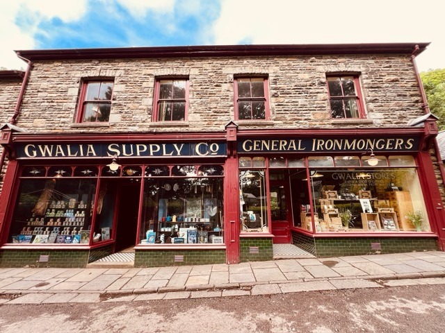Red shopfront of Gwalia Stores and general ironmongers at St Fagans