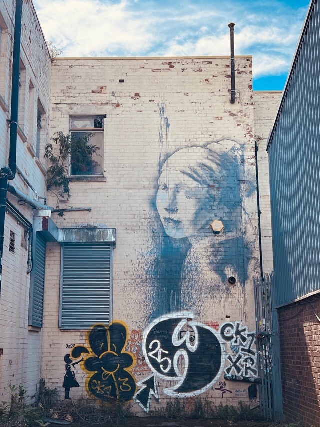 Girl with the Pierced Eardrum Banksy in Bristol